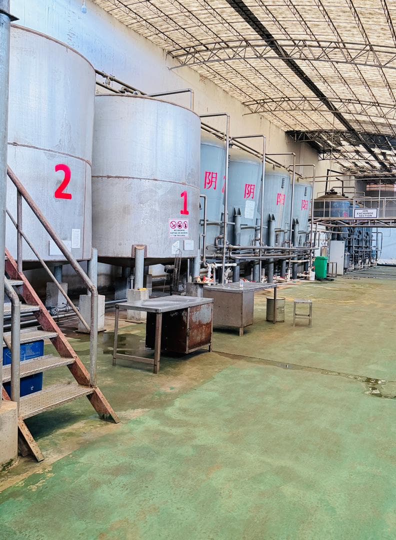 Ion exchange section with numbered stainless steel tanks at Tianran Biotech — water purification for gelatin processing